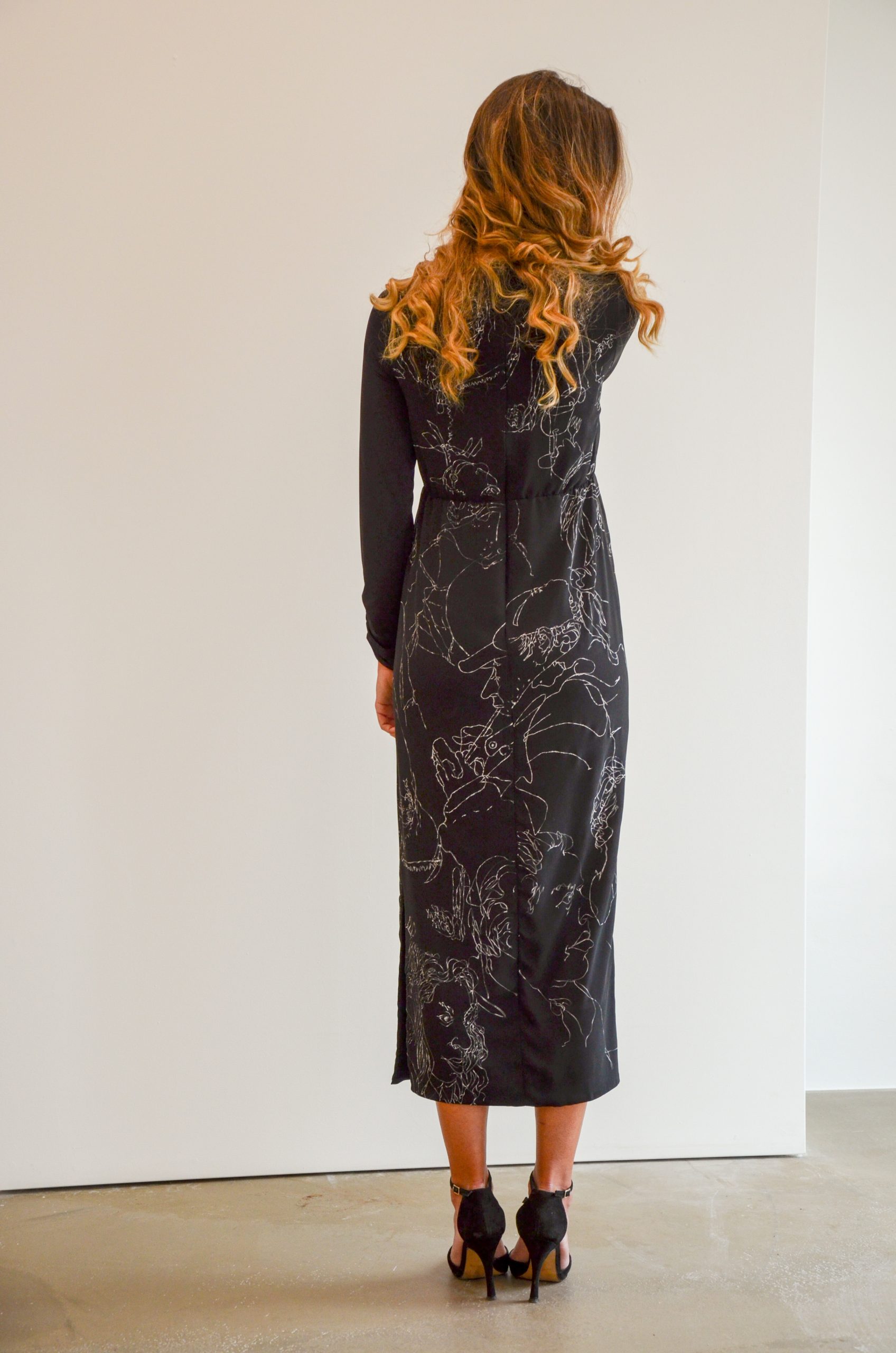 Black dress with hand made drawn white figure design VII.